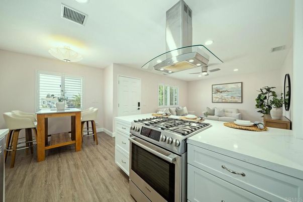 Dining room, Interior, Kitchen, Recessed Lighting, Stainless Steel Appliances, Wood Texture Flooring