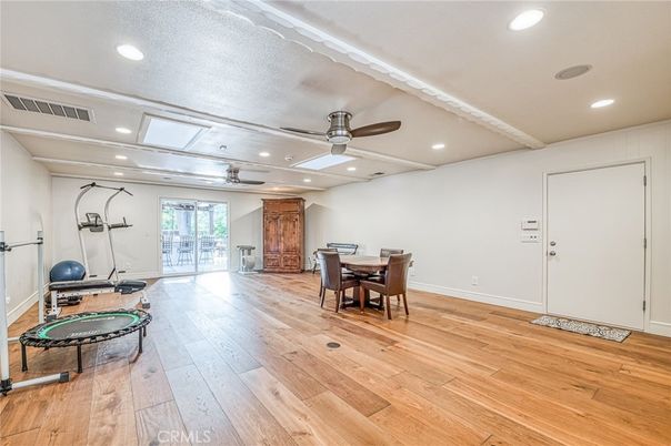 Dining room, Fitness Equipment, Game Room, Interior, Recessed Lighting, Wood Texture Flooring