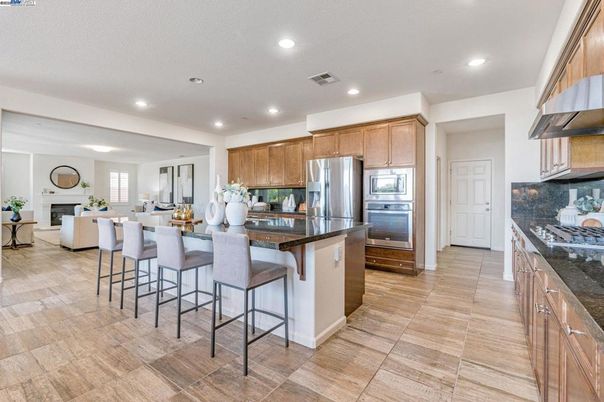 Fireplace, Interior, Kitchen, Living room, Recessed Lighting, Stainless Steel Appliances