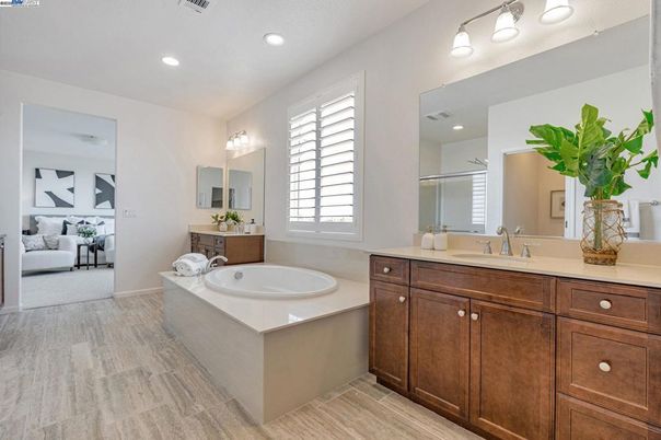 Bathroom, Dual Sink Vanities, Interior, Recessed Lighting, Wood Texture Flooring