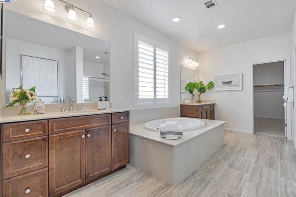Bathroom, Dual Sink Vanities, Interior, Recessed Lighting, Wood Texture Flooring