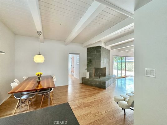 Dining room, Fireplace, Interior, Pendant Lights, Stone Walls, Wood Texture Flooring