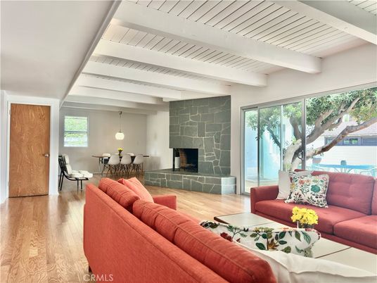 Dining room, Fireplace, Interior, Living room, Pendant Lights, Stone Walls, Wood Texture Flooring