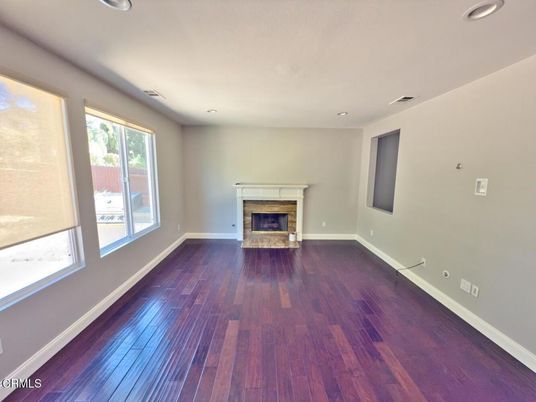 Empty room, Fireplace, Interior, Recessed Lighting, Wood Texture Flooring