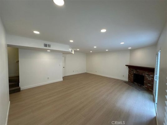 Empty room, Fireplace, Interior, Recessed Lighting, Wood Texture Flooring