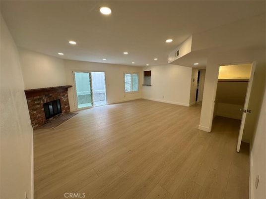 Empty room, Fireplace, Interior, Recessed Lighting, Wood Texture Flooring