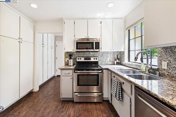 Interior, Kitchen, Recessed Lighting, Stainless Steel Appliances, Wood Texture Flooring