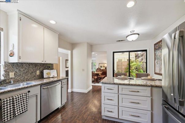 Interior, Kitchen, Recessed Lighting, Stainless Steel Appliances, Wood Texture Flooring