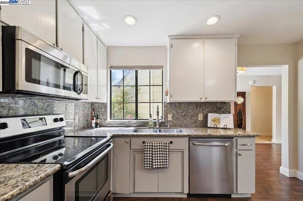 Interior, Kitchen, Recessed Lighting, Stainless Steel Appliances, Wood Texture Flooring