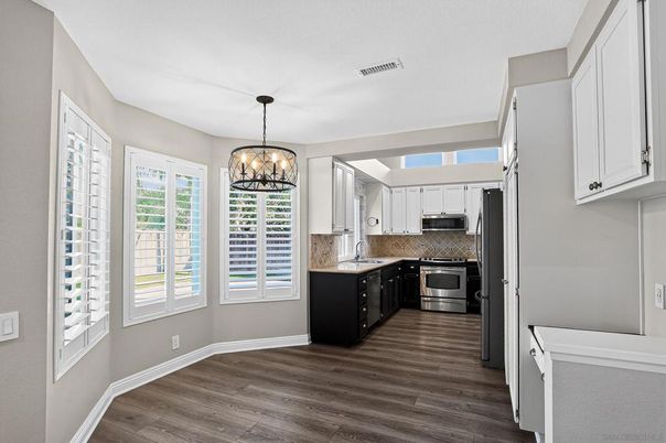 Chandelier, Interior, Kitchen, Pendant Lights, Stainless Steel Appliances, Wood Texture Flooring