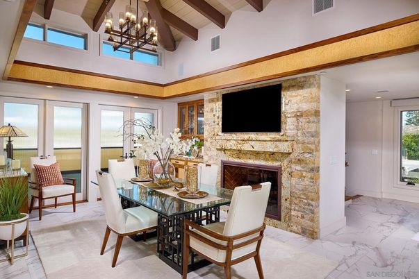 Chandelier, Dining room, Fireplace, Interior, Marble, Recessed Lighting, Water, Wooden Beams