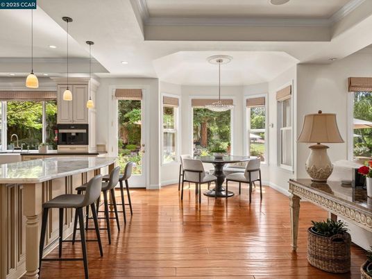 Dining room, Interior, Kitchen, Pendant Lights, Recessed Lighting, Stainless Steel Appliances, Wood Texture Flooring