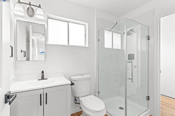 Bathroom, Glass Shower, Interior, Marble Walls, Wood Texture Flooring