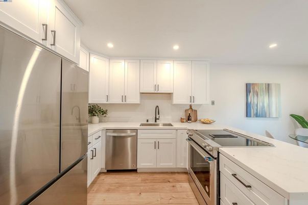 Interior, Kitchen, Recessed Lighting, Stainless Steel Appliances, Wood Texture Flooring