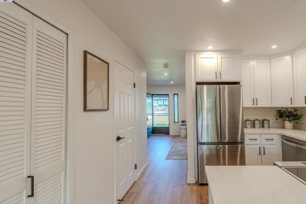 Interior, Kitchen, Recessed Lighting, Stainless Steel Appliances, Wood Texture Flooring