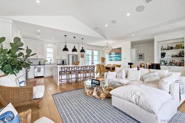 Chandelier, Dining room, Interior, Kitchen, Living room, Pendant Lights, Recessed Lighting, Stainless Steel Appliances, Wood Texture Flooring