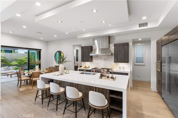 Dining room, Interior, Kitchen, Recessed Lighting, Stainless Steel Appliances, Wood Texture Flooring