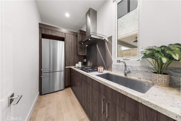 Interior, Kitchen, Recessed Lighting, Stainless Steel Appliances, Wood Texture Flooring
