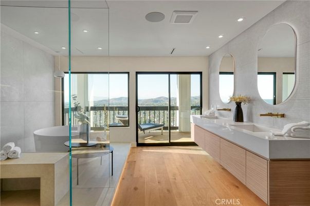 Bathroom, Dual Sink Vanities, Glass Shower, Interior, Recessed Lighting, Wood Texture Flooring