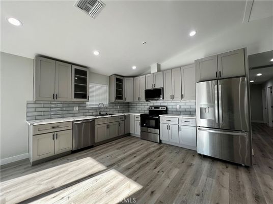 Interior, Kitchen, Recessed Lighting, Stainless Steel Appliances, Wood Texture Flooring