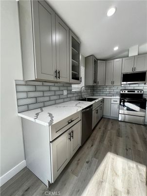 Interior, Kitchen, Recessed Lighting, Stainless Steel Appliances, Wood Texture Flooring
