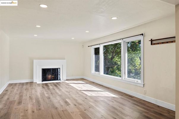 Empty room, Fireplace, Interior, Recessed Lighting, Wood Texture Flooring