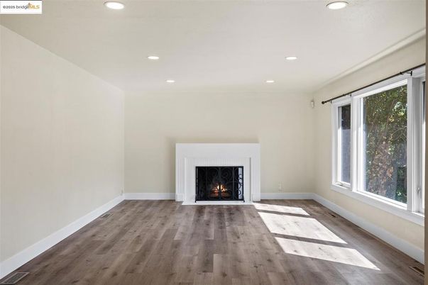 Empty room, Fireplace, Interior, Recessed Lighting, Wood Texture Flooring