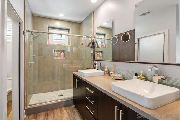 Bathroom, Dual Sink Vanities, Glass Shower, Interior, Recessed Lighting, Wood Texture Flooring