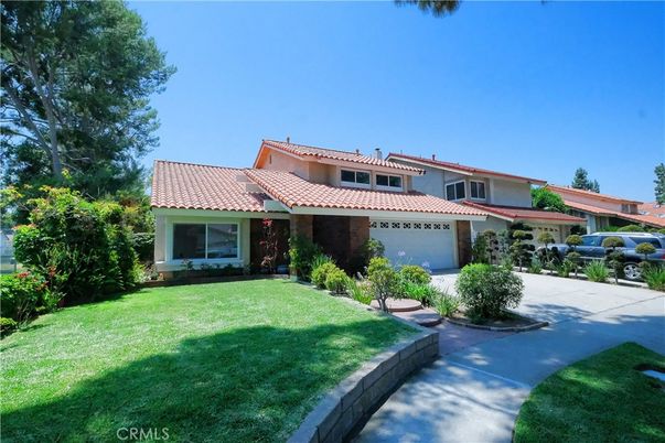 Attached, Backyard, Exterior, Facade, Brick Facade, Mediterranean
