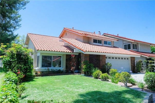 Attached, Backyard, Exterior, Facade, Brick Facade, Mediterranean