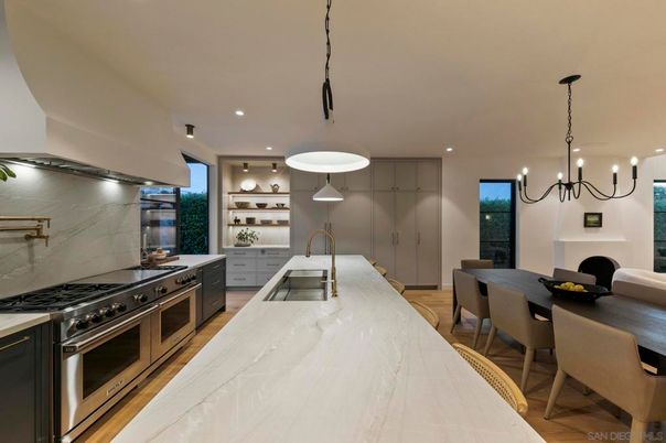 Chandelier, Dining room, Interior, Kitchen, Pendant Lights, Recessed Lighting, Stainless Steel Appliances, Wood Texture Flooring