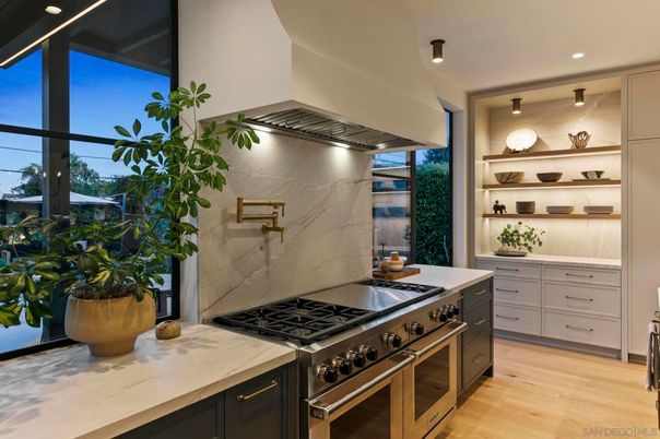 Interior, Kitchen, Marble Walls, Recessed Lighting, Stainless Steel Appliances, Wood Texture Flooring