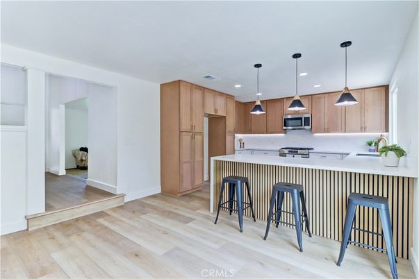 Interior, Kitchen, Pendant Lights, Recessed Lighting, Stainless Steel Appliances, Wood Texture Flooring