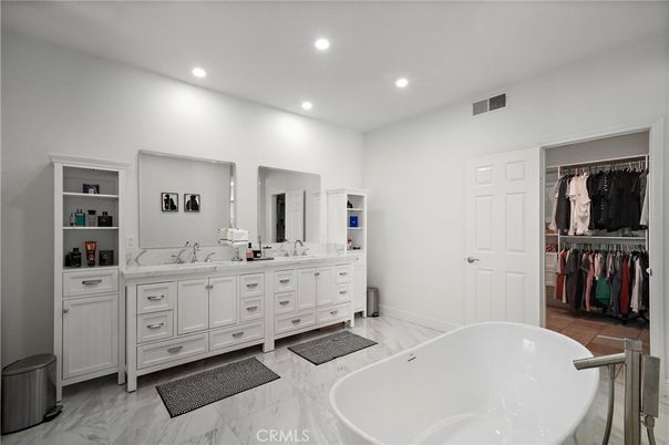 Bathroom, Dual Sink Vanities, Free Standing Baths, Interior, Marble, Recessed Lighting, Walk-in Closets