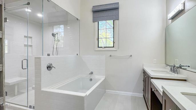 Bathroom, Dual Sink Vanities, Glass Shower, Interior, Recessed Lighting, Wood Texture Flooring