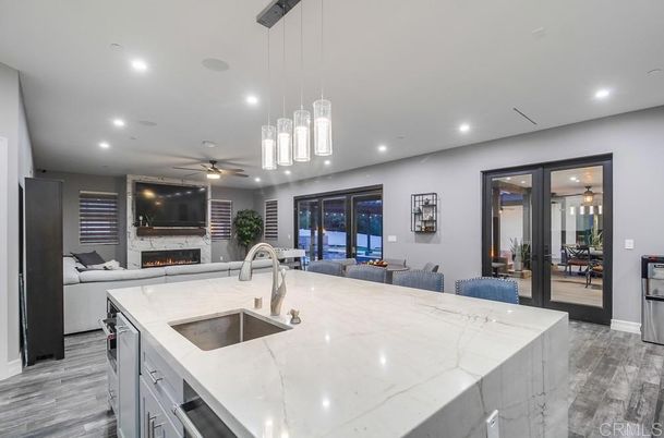 Dining room, Fireplace, Interior, Kitchen, Living room, Pendant Lights, Recessed Lighting, Wood Texture Flooring