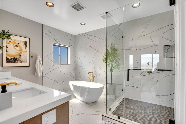 Bathroom, Dual Sink Vanities, Free Standing Baths, Glass Shower, Interior, Marble, Marble Walls, Recessed Lighting