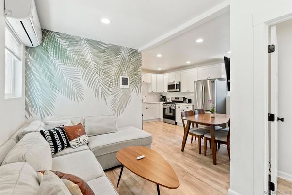 Dining room, Interior, Kitchen, Living room, Recessed Lighting, Stainless Steel Appliances, Wood Texture Flooring