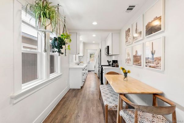 Dining room, Interior, Kitchen, Recessed Lighting, Stainless Steel Appliances, Wood Texture Flooring