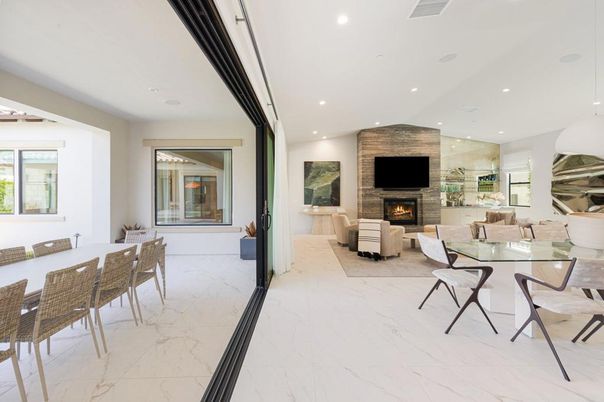 Dining room, Fireplace, Interior, Living room, Marble, Recessed Lighting, Stone Walls