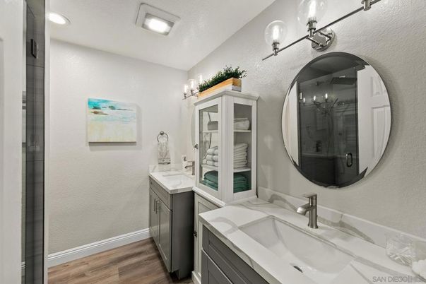 Bathroom, Dual Sink Vanities, Interior, Recessed Lighting, Wood Texture Flooring