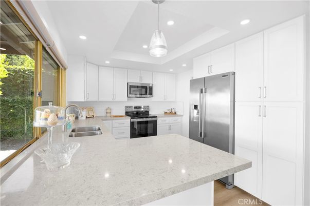 Interior, Kitchen, Pendant Lights, Recessed Lighting, Stainless Steel Appliances, Wood Texture Flooring