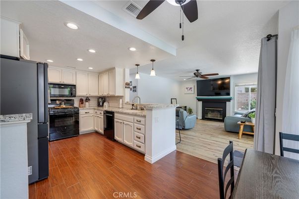 Fireplace, Interior, Kitchen, Pendant Lights, Recessed Lighting, Wood Texture Flooring