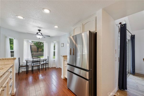 Dining room, Interior, Kitchen, Recessed Lighting, Stainless Steel Appliances, Wood Texture Flooring