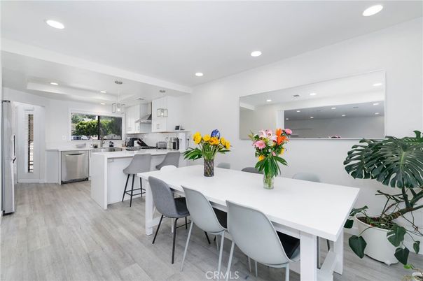 Dining room, Interior, Kitchen, Pendant Lights, Recessed Lighting, Stainless Steel Appliances, Wood Texture Flooring