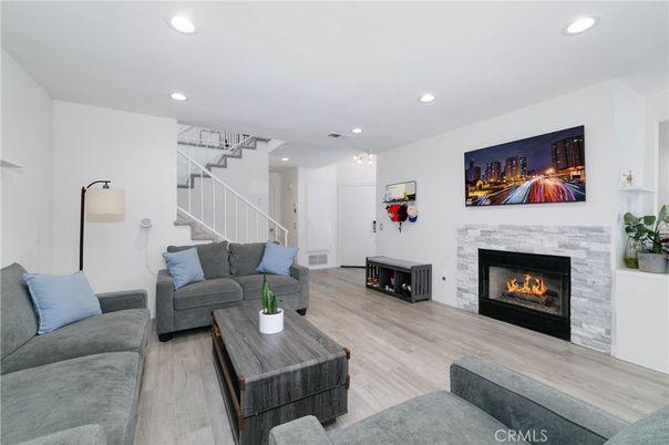 Fireplace, Interior, Living room, Recessed Lighting, Wood Texture Flooring