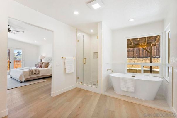 Bathroom, Bedroom, Free Standing Baths, Glass Shower, Interior, Recessed Lighting, Wood Texture Flooring
