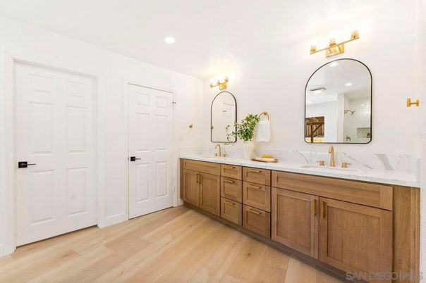 Bathroom, Dual Sink Vanities, Interior, Recessed Lighting, Wood Texture Flooring