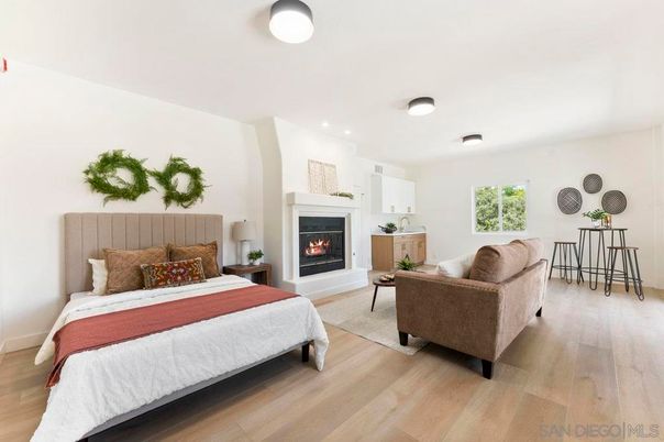 Bedroom, Fireplace, Interior, Recessed Lighting, Wood Texture Flooring