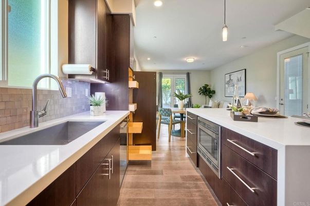 Dining room, Interior, Kitchen, Pendant Lights, Recessed Lighting, Stainless Steel Appliances, Wood Texture Flooring
